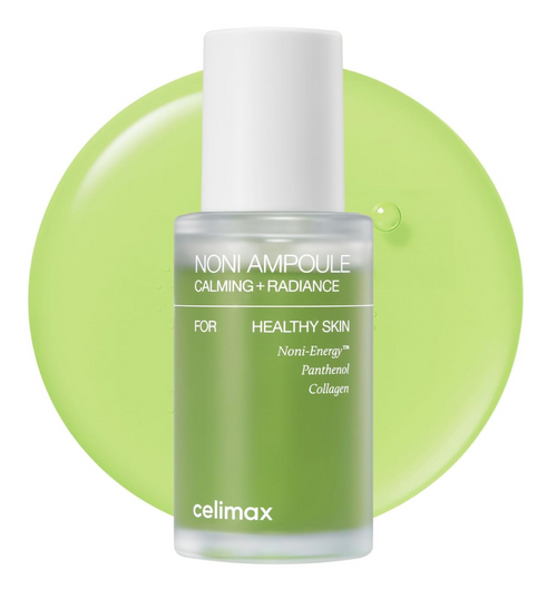 Frasco de vidrio verde de celimax Noni Ampoule Calming + Radiance con tapa blanca, texto “For Healthy Skin; Noni-Energy, Panthenol, Collagen”, sobre fondo con gota verde translúcida.